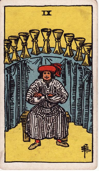 תשעה של גביעים tarot card