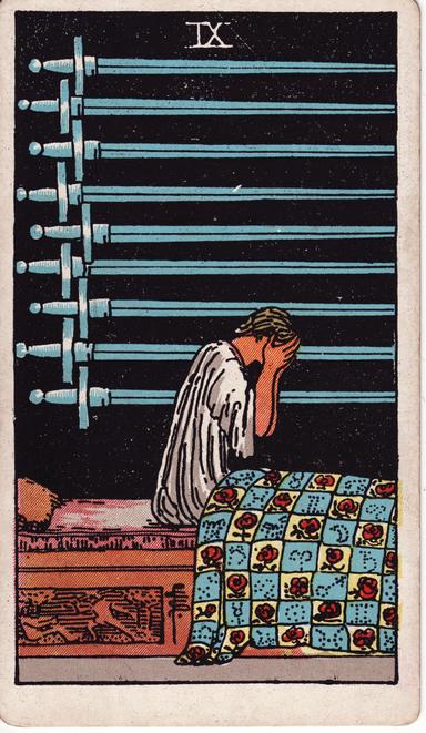 תשעה של חרבות tarot card